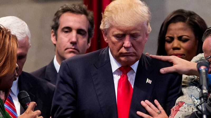 Michael Cohen, pictured  behind Donald Trump on the left, at a campaign stop at the New Spirit Revival Center in Cleveland, in  2016.  Photograph: Eric Thayer/The New York Times