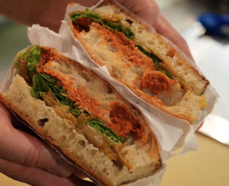Fresh focaccia layered with romesco sauce, confit leeks, gem lettuce and pickles at The Fold, Derry. Photograph: Instagram