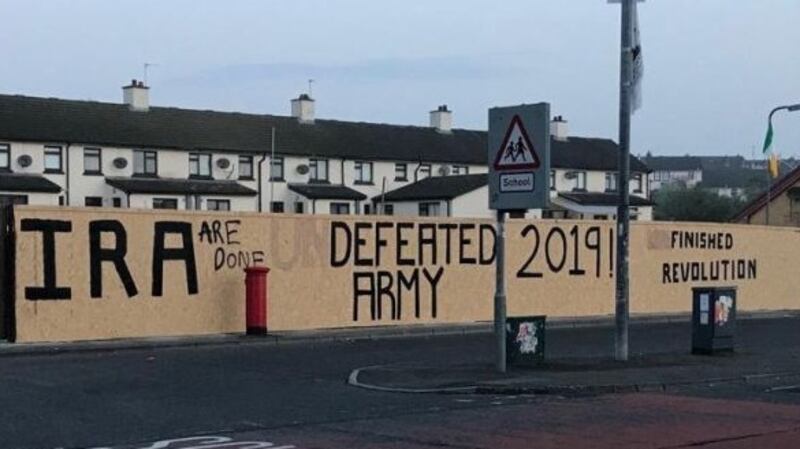Amended dissident republican graffiti in Derry