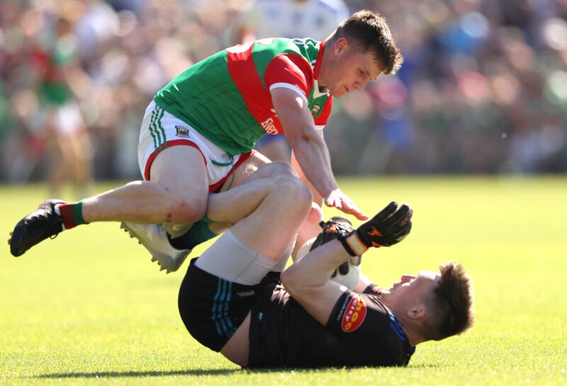 Mayo's James Carr challenges Rory Beggan of Monaghan. Photograph: Tom Maher/Inpho

