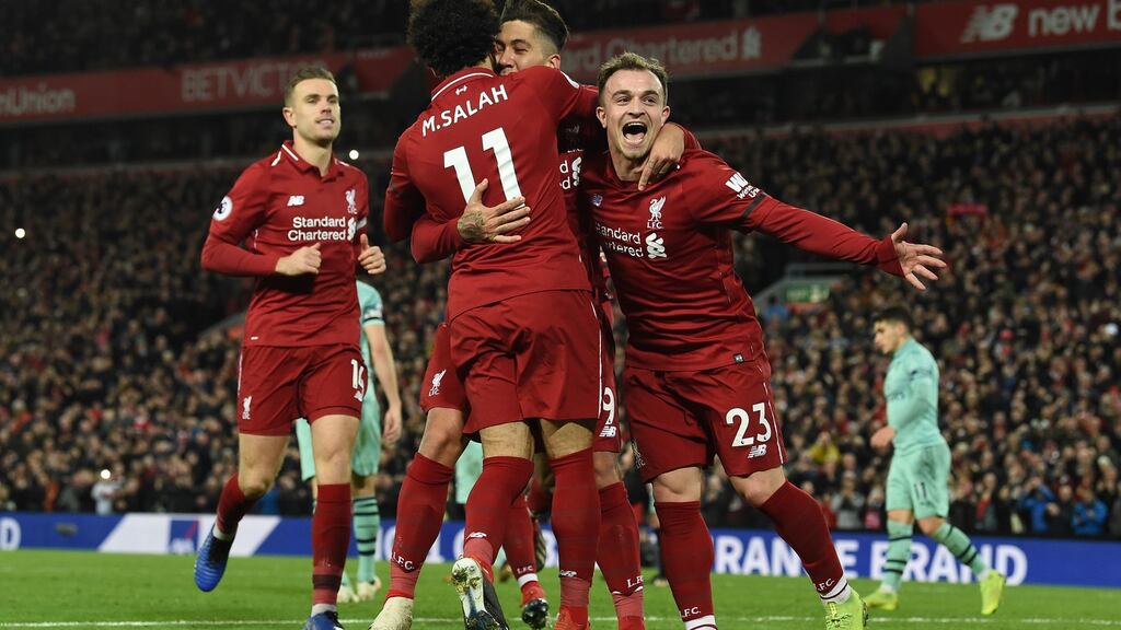 Liverpool’s Roberto Firmino celebrates scoring his side’s fifth goal during their Premier League win over Arsenal at Anfield. Photo: Paul Ellis/Getty Images