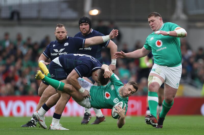 Scotland's Huw Jones tackles Ireland's Jordan Larmour. Photograph: Liam McBurney/PA Wire