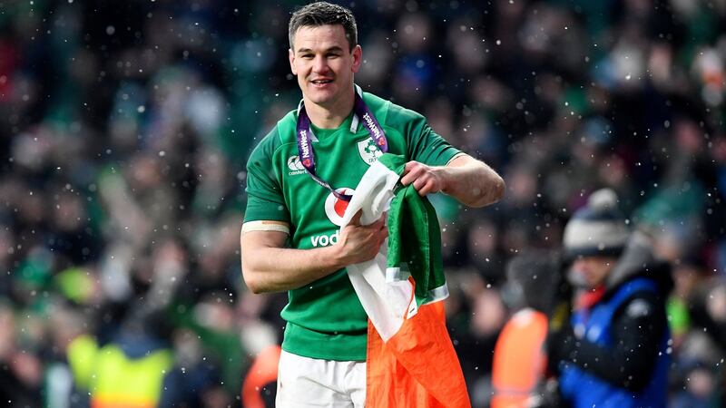 Ireland’s Johnny Sexton celebrates beating England and winning the  Glad Slam at Twickenham. Photograph: EPA
