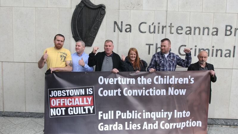 Defendants Paul Kiernan, Keith Preston, Declan Kane, Antoinette Kane, Tommy Kelly and Peter Herbert outside Dublin Circuit Criminal Court after they were all found not guilty on charges of  false imprisonment of then-tánaiste Joan Burton at a water charges protest in Jobstown in 2014. Photograph: Collins Courts