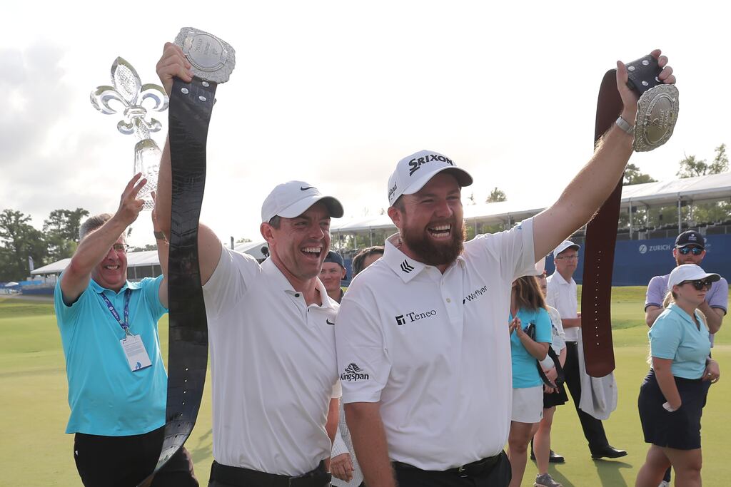 Rory McIlroy and Shane Lowry celebrate winning the Zurich Classic. Photograph: Jonathan Bachman/Getty Images