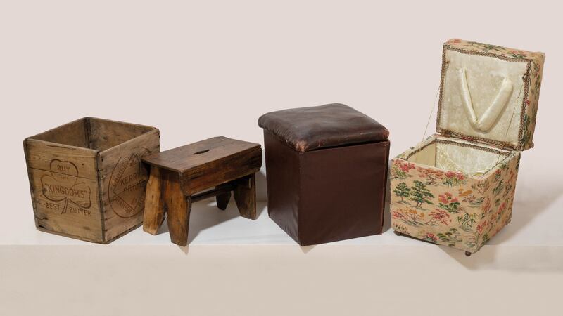 From left, pine butter box for holding 56lb of butter, marked with the creamery’s details. A board ended stool made from a butterbox, and two converted with hinged lids and upholstered seats, far right, as a sewing box. Photograph: R Paschhoff, courtesy Cork Butter Museum