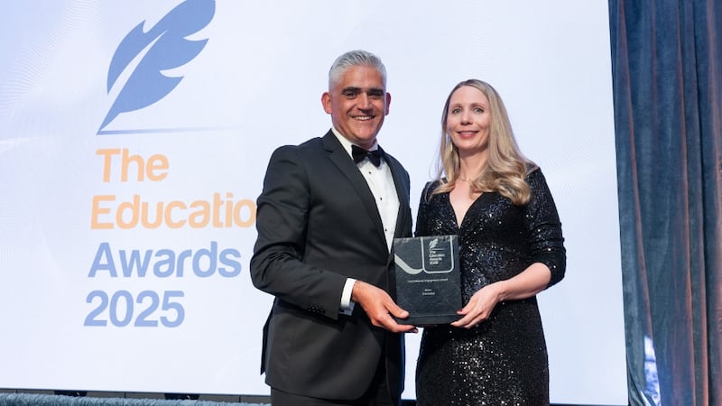 Donal McAlister, awards judge, presents the most innovative digital transformation to Cliona Campbell, TUS Global