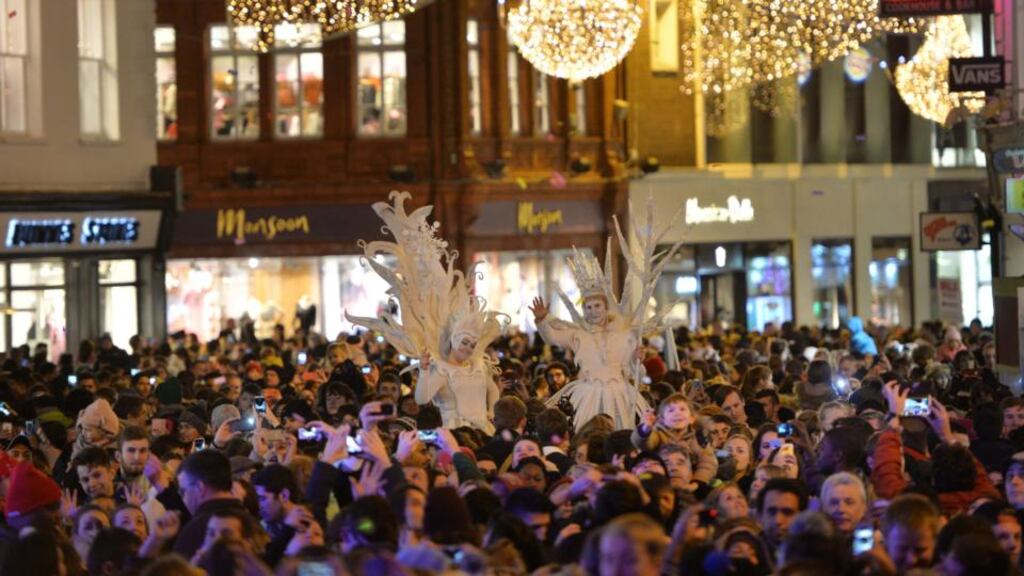 ‘The Christmas lights are twinkling and the cocktail glasses are clinking, but there are endless streams of people begging.’ Photograph: Alan Betson / The Irish Times