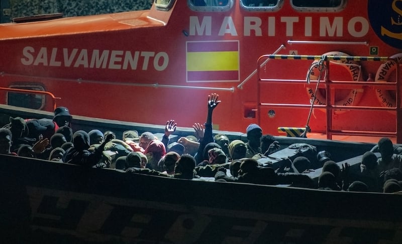 More than 100 migrants - 17 of them minors - wait to disembark from a "cayuco" boat that arrived last September, 2024 in the Canary Islands. Photograph: Antonio Sempere/ AFP