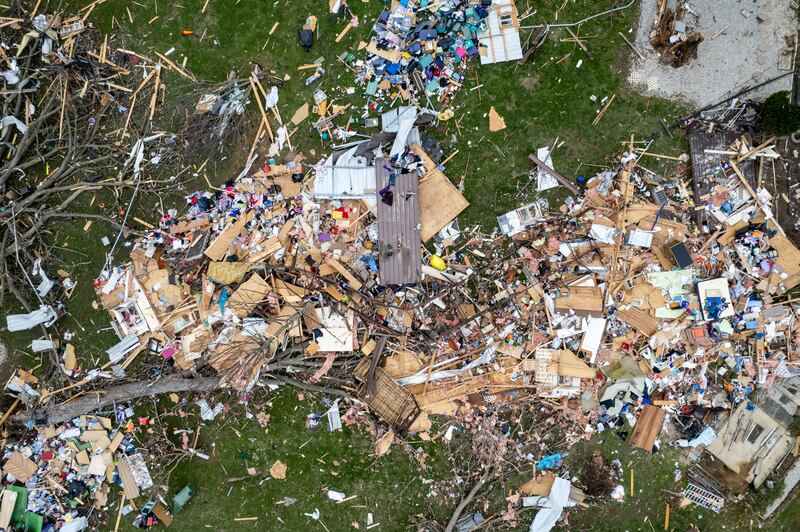 The aftermath of a tornado strike in Sullivan, Indiana. Photograph: AJ Mast/The New York Times
                      