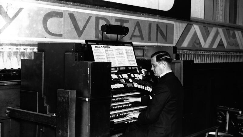August 1929: An organist at the  Davis Theatre in Croydon, London.  Photograph: Fox Photos/Getty Images