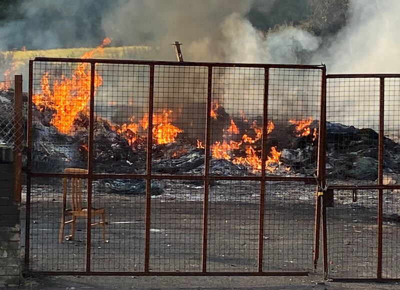 The remains of the Moygashel bonfire, which had a replica mosque placed on top, and was set alight overnight. Photograph: Jonathan McCambridge/PA Wire