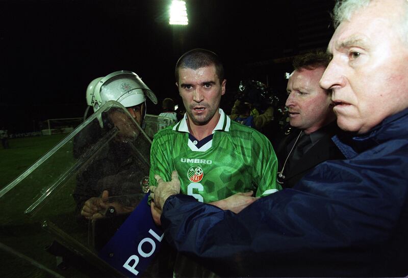 Roy Keane being escorted off the pitch after Ireland's draw with Turkey in Bursa in 1999. Photograph: Patrick Bolger/Inpho