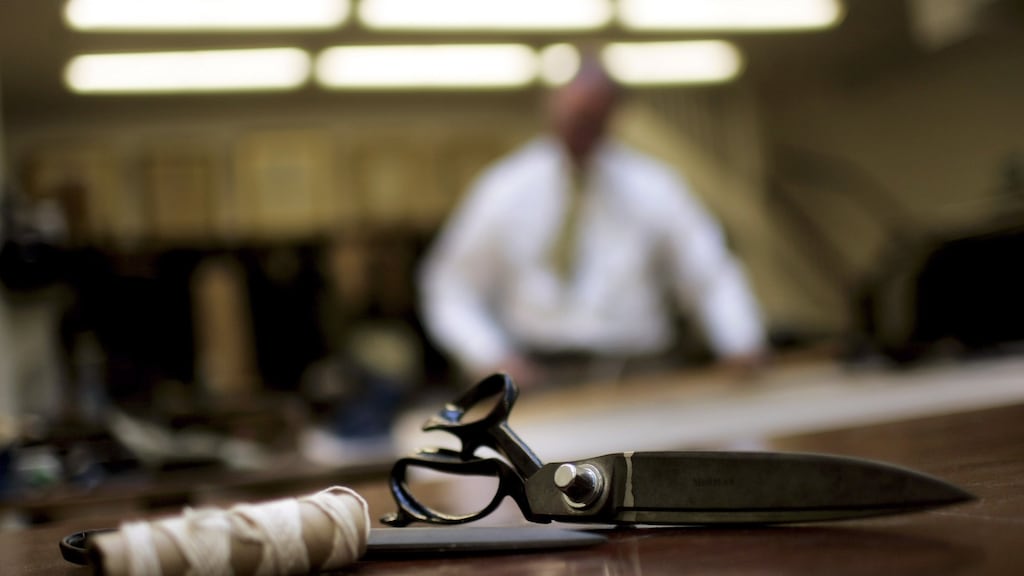 It was already too late as he was on one knee measuring part of my leg and lapsing into an anecdote about one of the famous figures he has dressed. Photograph: Bruno Vincent/Getty