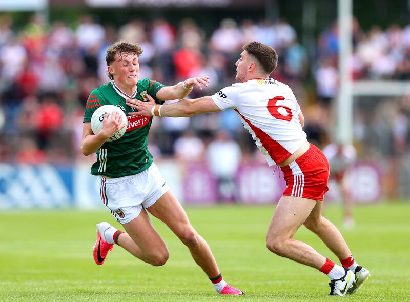 Mayo's Kobe McDonald with Niall Devlin of Tyrone. Photograph: Tom O’Hanlon/Inpho