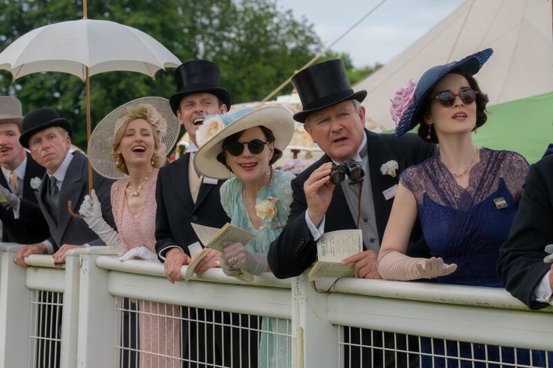 From left are Laura Carmichael (with umbrella) as Lady Edith, Harry Hadden-Paton as Bertie Hexham, Elizabeth McGovern as Cora Grantham, Hugh Bonneville as Robert Grantham and Michelle Dockery as Lady Mary. Photograph: Rory Mulvey/Focus Features