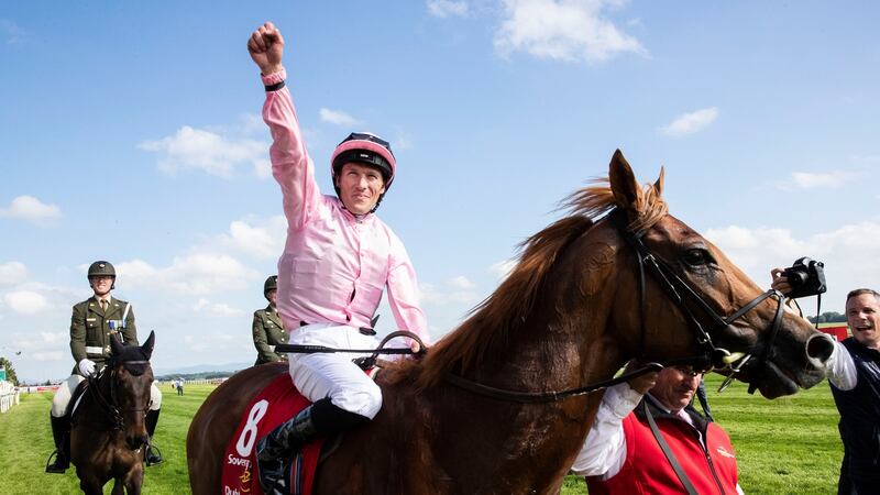 Jockey Pádraig Beggy celebrates winning the Dubai Duty Free Irish Derby on  Sovereign. Photograph: Morgan Treacy/Inpho