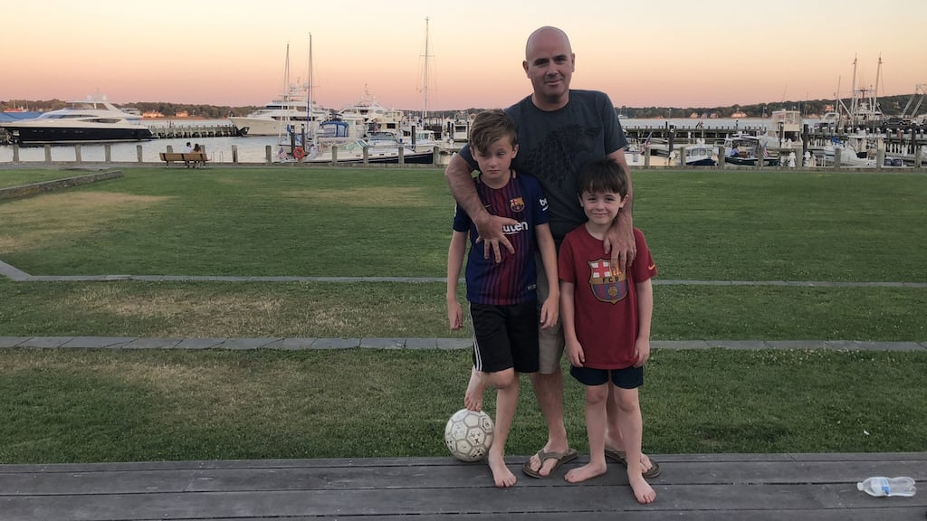 Dave Hannigan with his sons Charlile and Finn.
