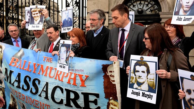 Former Sinn Féin leader Gerry Adams with solicitor Pádraig Ó Muirigh and relatives of the Ballymurphy  victims on January 30th, 2014. Photograph: Cyril Byrne