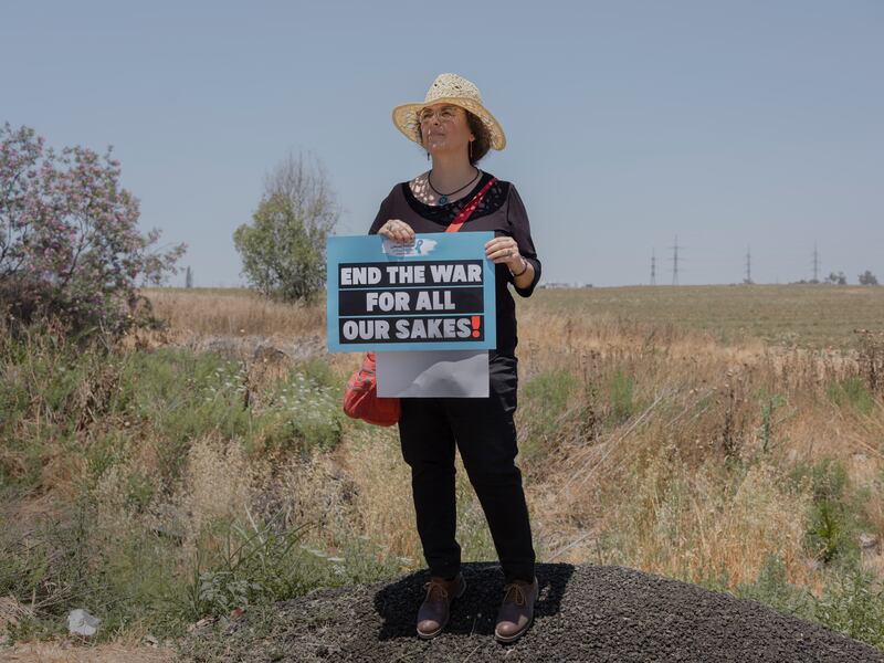 Tamar Parush, an Israeli lecturer in sociology, during an anti-war protest at the Shaar Hanegev junction near the Gaza border in May. Photograph: Amit Elkayam/New York Times
                      