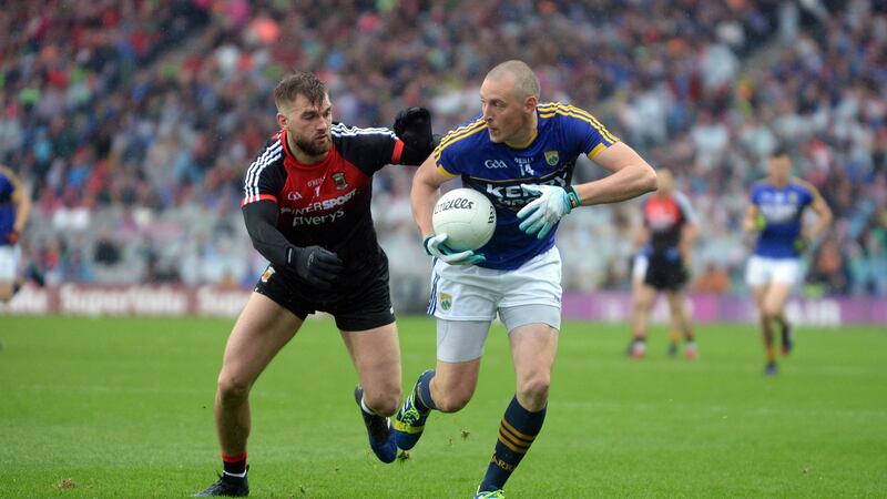 Aidan O’Shea with Kieran Donaghy. The one high ball directed towards Donaghy in the absence of Aidan O’Shea resulted in Mayo’s worst fears: a goal. Photograph: Don MacMonagle