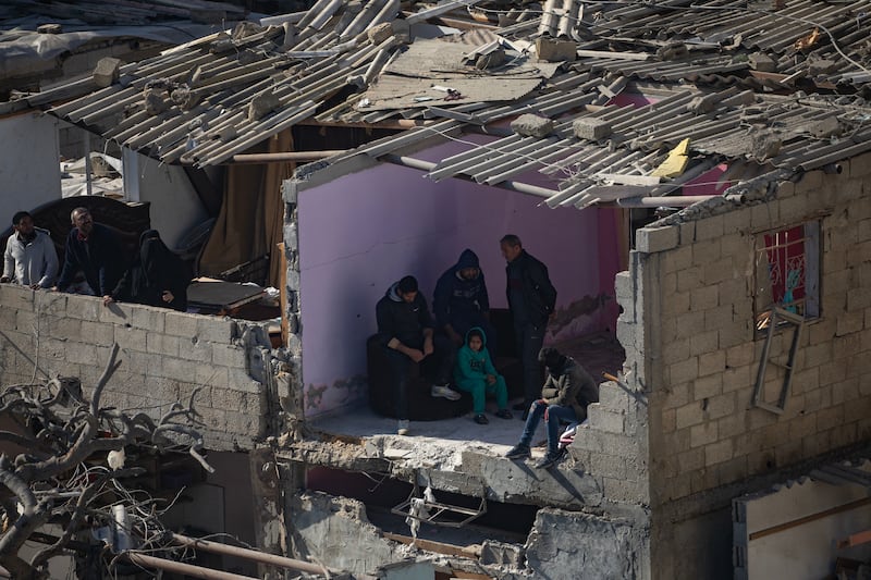 Palestinians inspect destroyed houses following an Israeli airstrike on the al-Farouq mosque in Rafah refugee camp on Thursday. Photograph: Haitham Imad/EPA