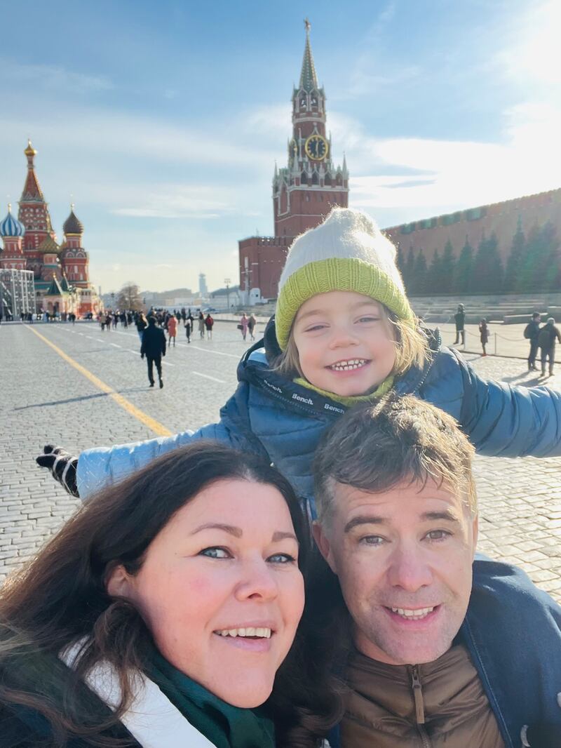 Jason Corcoran in Red Square, Moscow, with his wife, Alsu, and their son, Farid