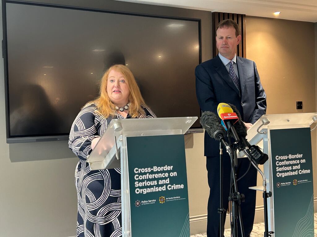 Stormont justice minister Naomi Long and Minister for Justice Jim O’Callaghan speaking at the Cross-Border Conference on Serious and Organised Crime at the Europa Hotel in Belfast. Photograph: Rebecca Black/PA Wire