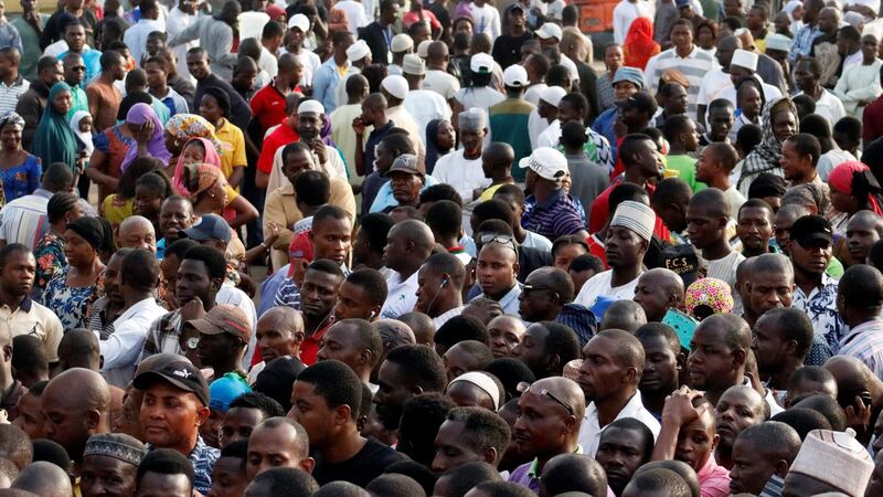 Voters queue during the presidential election at a polling station in Maraba, Abuja, Nigeria. Photograph: Reuters