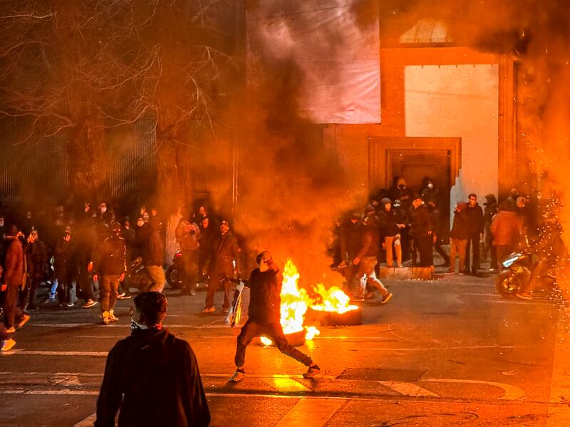 Iranians gather while blocking a street during a protest in Tehran, Iran on January 9th, 2026. The nationwide protests started in Tehran's Grand Bazaar against the failing economic policies in late December and spread to universities and other cities. Photograph: Mahsa/Middle East Images/AFP via Getty Images