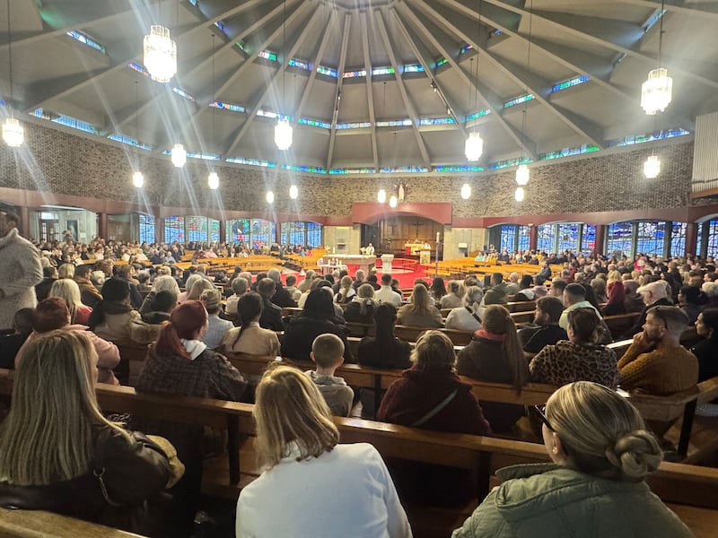 People attend the vigil at Sacred Heart Church in Waterford. Photograph: PA 