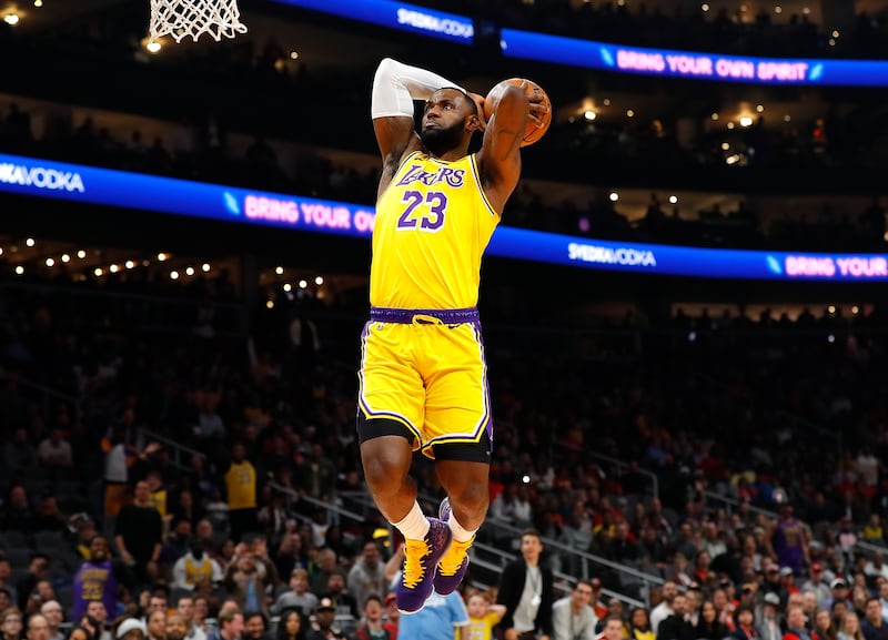 LeBron James of the Los Angeles Lakers dunks against the Atlanta Hawks at State Farm Arena, Atlanta, Georgia, on December 15th, 2019. Photograph: Kevin C Cox/Getty
