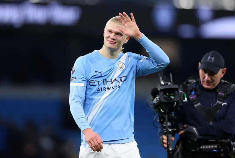 Erling Haaland of Manchester City waves to fans after victory. Photograph: Molly Darlington/Getty