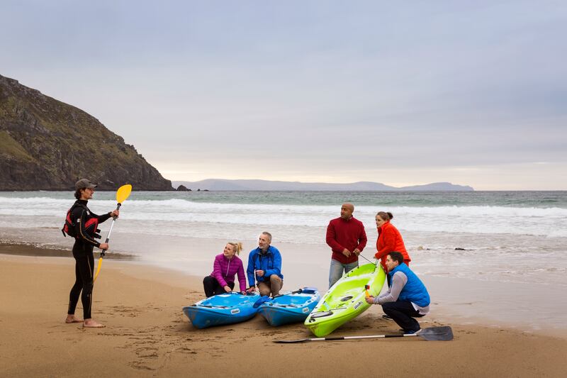 Kayaking on the beach in Dingle, Co Kerry. Photograph: Failte Ireland