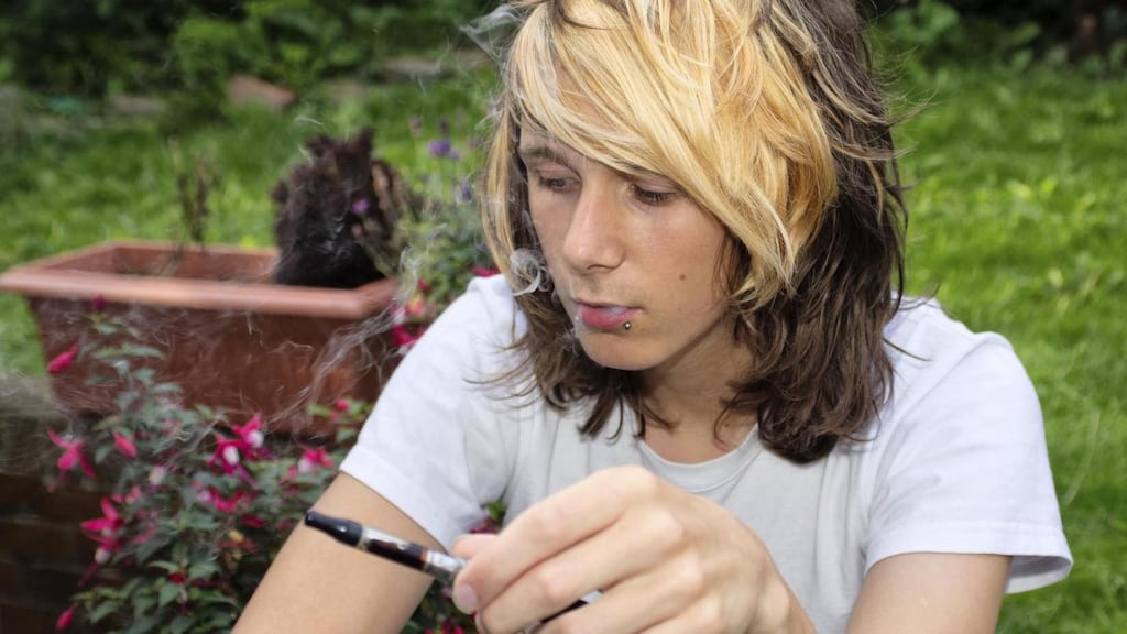 Smoking an electric cigarette: used as a verb vape means inhaling and exhaling the vapour produced by e-cigarettes, while it can also be used as a noun to refer to the devices themselves. Photograph: Thinkstock