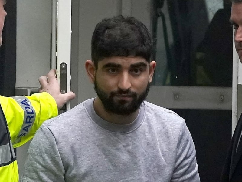 Yousef Palani is led into Sligo District Court after being charged in relation to the Sligo murders. Photograph: Brian Lawless/PA 