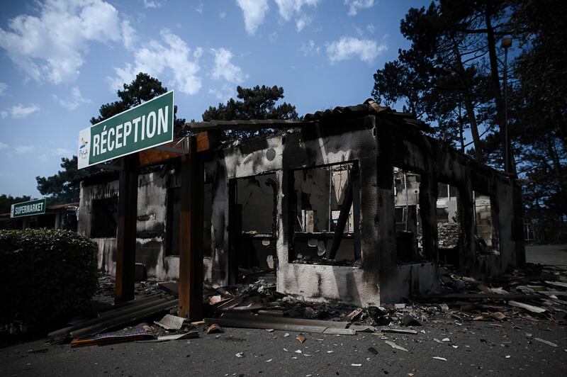 A picture taken on Tuesday shows the camping reception ravaged by a  wildfire in Pyla sur Mer in Gironde, southwestern France where firefighters are struggling to contain two massive fires. Photograph: Philippe Lopez/Getty