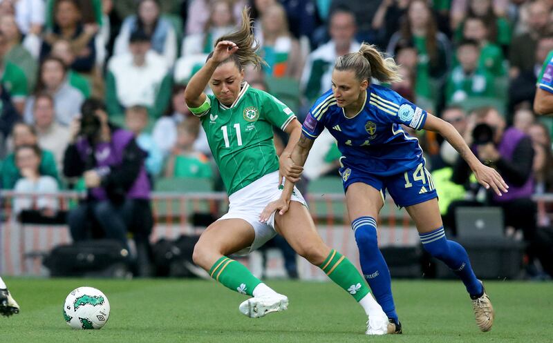 Ireland's midfielder Katie McCabe fights for the ball with Sweden's defender Nathalie Bjorn. Photograph: Paul Faith/AFP via Getty Images  