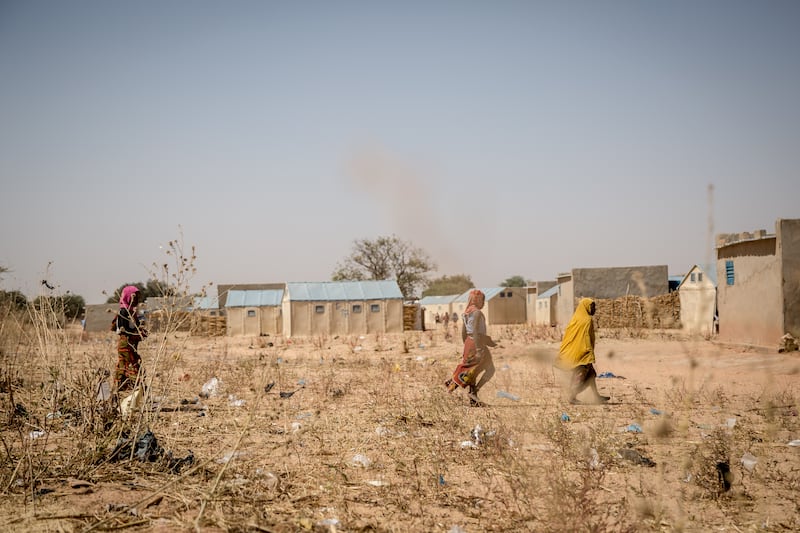 Nigerian children walk through a camp in southern Niger. Photograph: Sally Hayden
