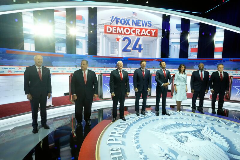 Republican presidential candidates before Wednesday's debate:  former Arkansas governor Asa Hutchinson, former New Jersey governor Chris Christie, former vice president Mike Pence, Florida governor Ron DeSantis, businessman Vivek Ramaswamy, former UN ambassador Nikki Haley, senator Tim Scott and North Dakota governor Doug Burgum. Photograph: Morry Gash/AP