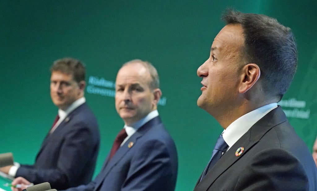 Left to right: Green Party leader Eamon Ryan, Taoiseach Micheál Martin and Tánaiste Leo Varadkar. Photograph: Niall Carson/PA