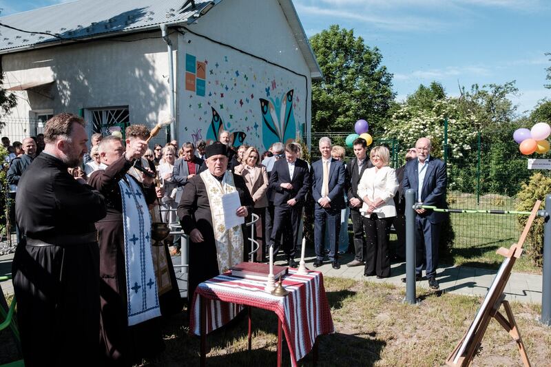 A local priest blesses the new playground at the Rozdil institution in Lviv, Ukraine. The playground was funded by Effective Aid Ukraine, an Irish charity.