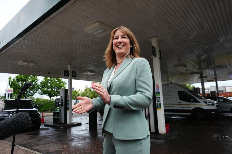 Rachel Reeves reacts as she speaks to media during her visit to a petrol station in Hunslet, near Leeds. Photograph: Jacob King/AFP via Getty Images