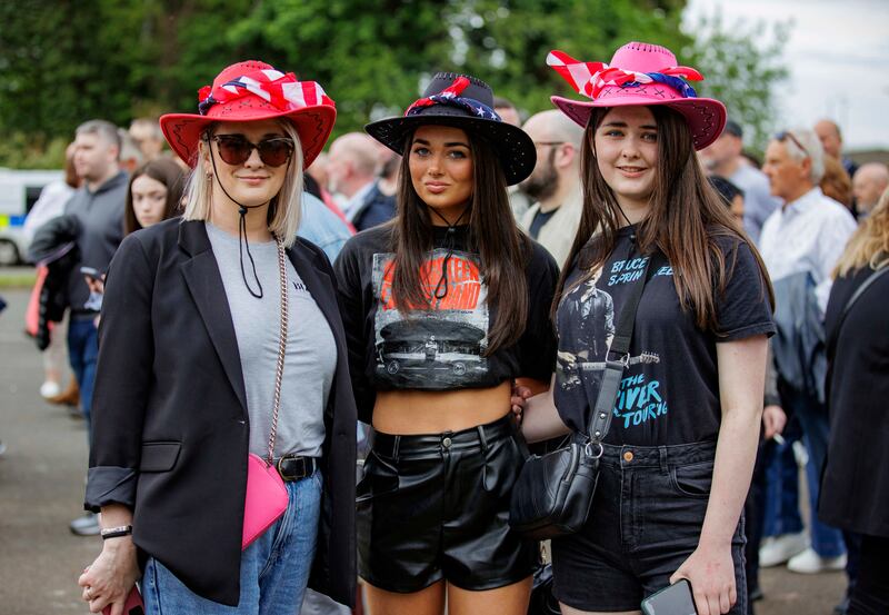 Fans (from left) Sinead McFarland with her daughters Aibhlinn and Dearbhla at Boucher Road Playing Fields in Belfast. Photograph: Liam McBurney 