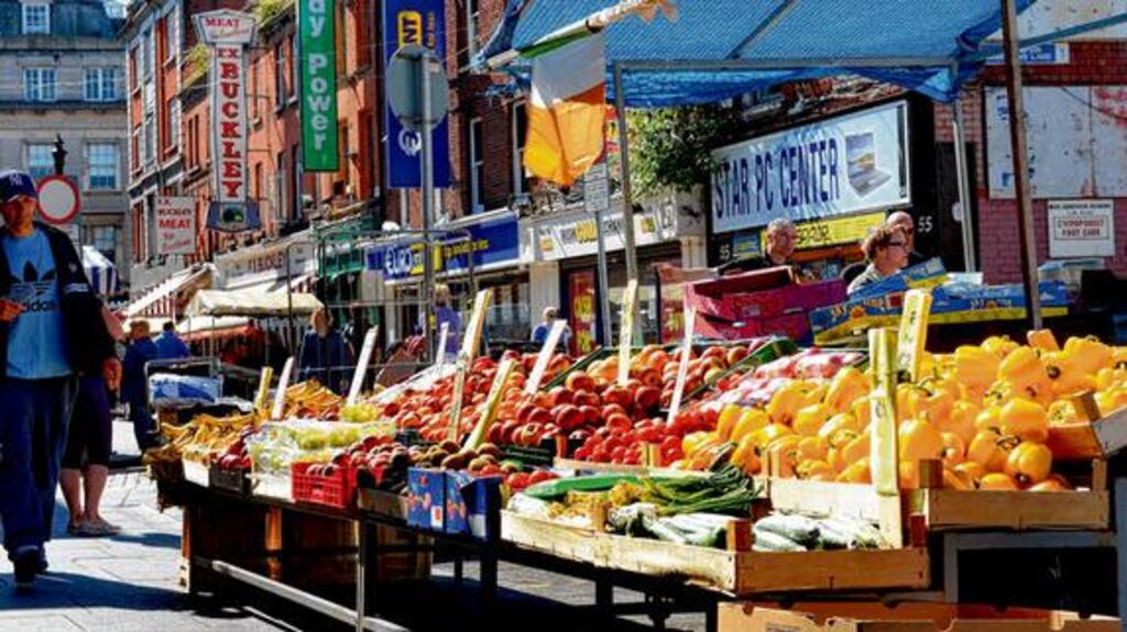 Moore Street, home to fruit and veg stalls, supermarkets and discount stores. Photograph: Brenda Fitzsimons
