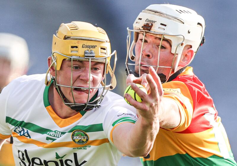 Offaly's Killian Sampson and Martin Kavanagh of Carlow challenge for the ball during the Joe McDonagh Cup final at Croke Park on Saturday. Photograph: Tom Maher/Inpho