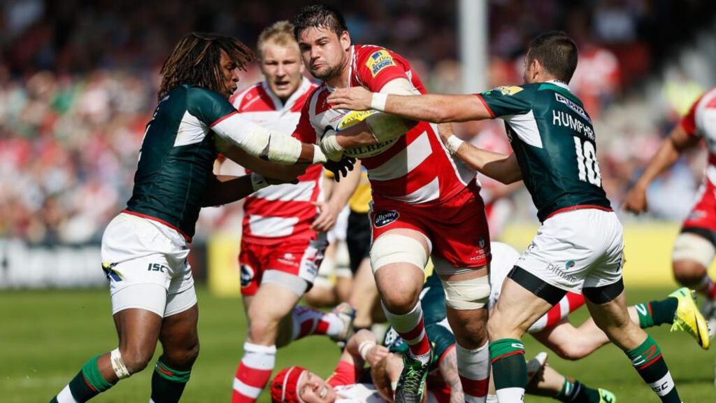 Elliott Stooke of Gloucester is tackled by Ian Humphreys (R) and Marland Yarde (L) of London Irish. Humphreys will return to Ulster this summer. Photograph: Harry Engels/Getty Images