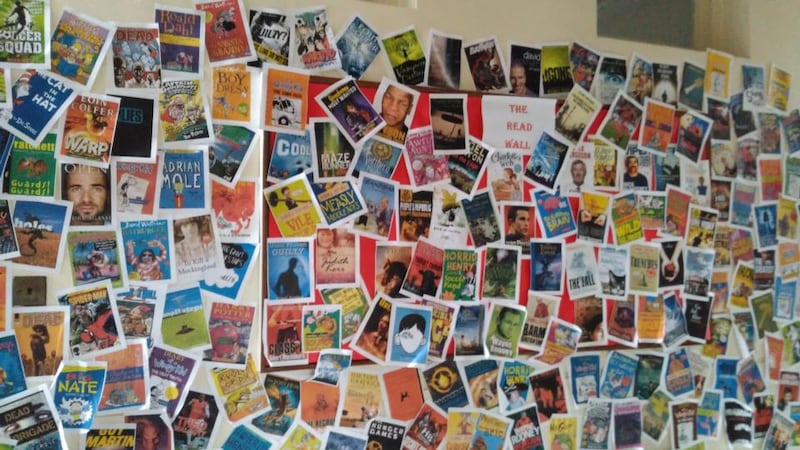 On entering the library corridor, students and visitors  are greeted by the Read Wall, which is a huge symbol and celebration of reading among the student population. The cover of every book read during the year is printed and pinned to this red wall