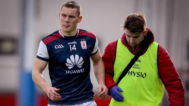 Cuala’s Con O’Callaghan leaves the pitch after he suffered a leg injury after scoring his side’s early goal against St brigid’s in the Dublin SHC Final at Parnell Park. Photograph: Oisín Keniry/Inpho