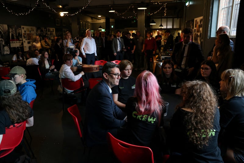 Burnham (centre) during a visit to The Oh Yeah centre in Belfast. Photograph: Cathal McNaughton/Pool/AFP via Getty Images